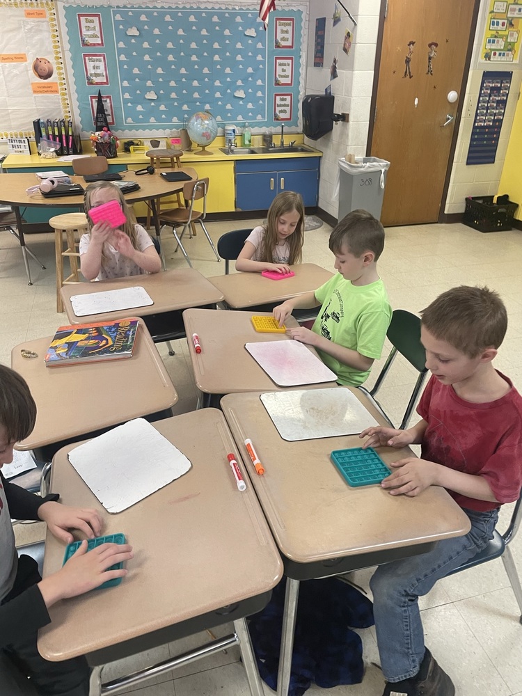 Mrs. Patterson's second grade classroom used Pop Its to make arrays in math. 